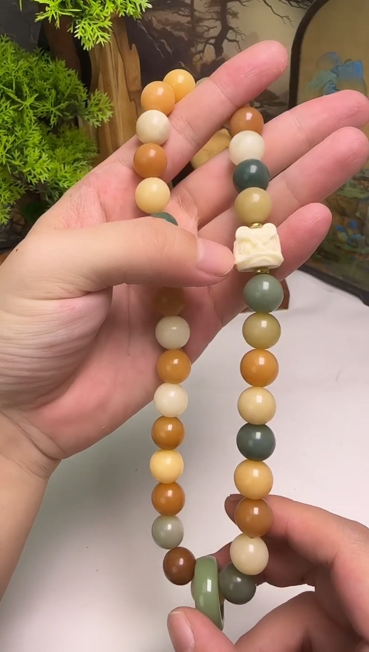 手串菩提根/象牙果糖果色多宝醒狮跑环双圈