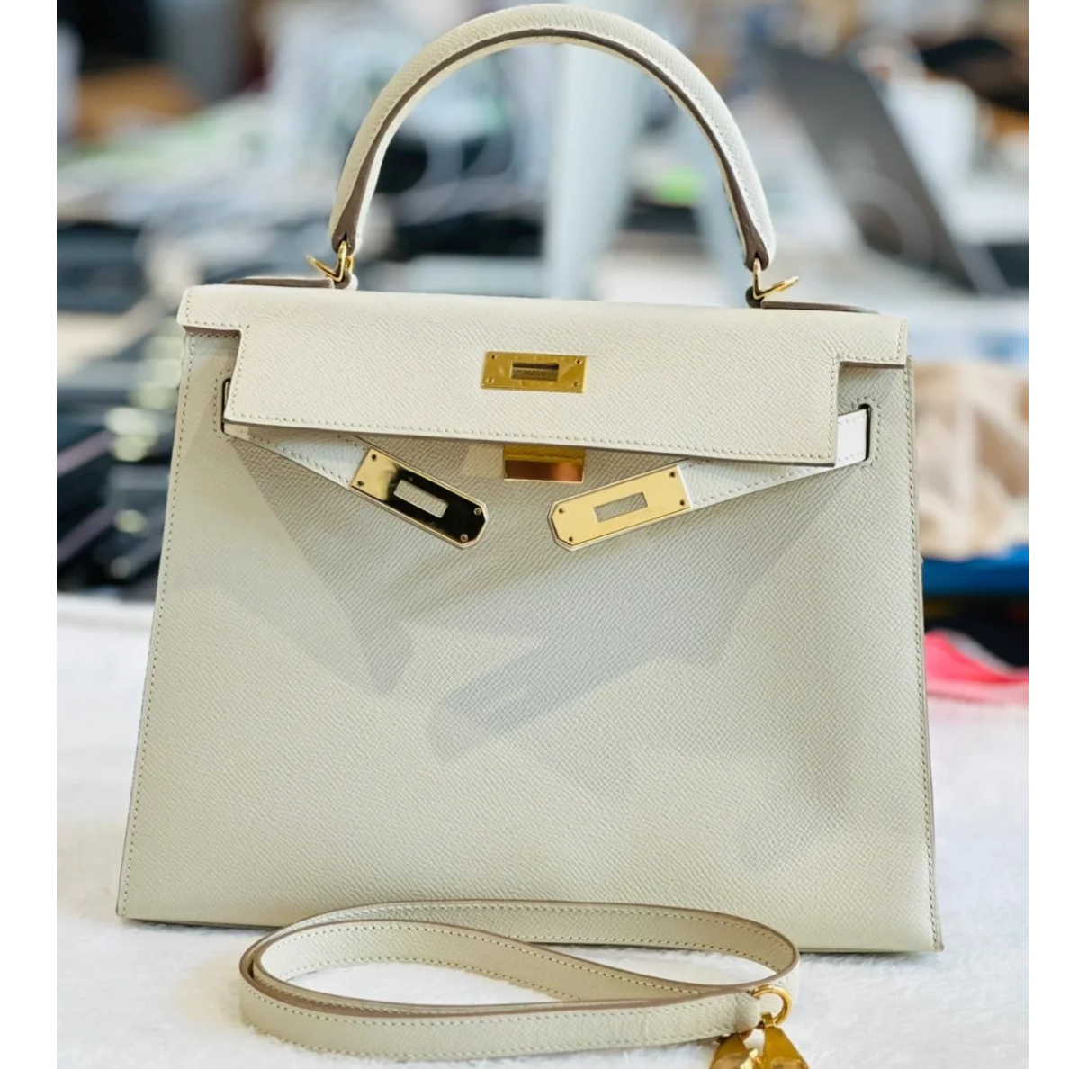 99新 Hermes/爱马仕 小花JerryKelly 28奶昔白 Ep皮 A刻 金扣包