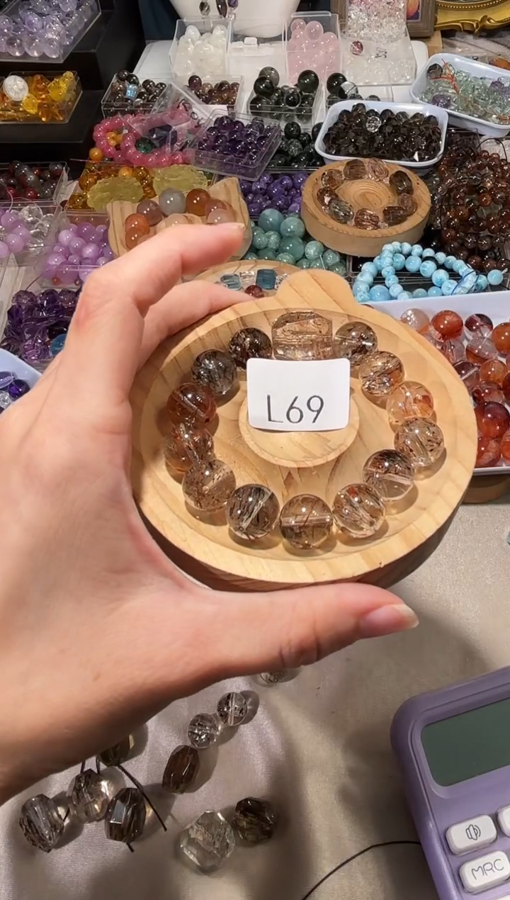 水晶手串未镶嵌L****?L69黑金超圆珠手串拍6