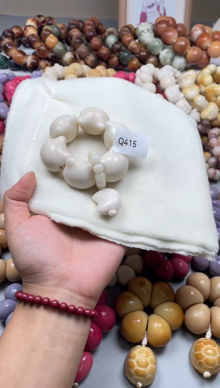 吊坠菩提根/象牙果Q415牙果猫头手捻27-28mm一串通货随机