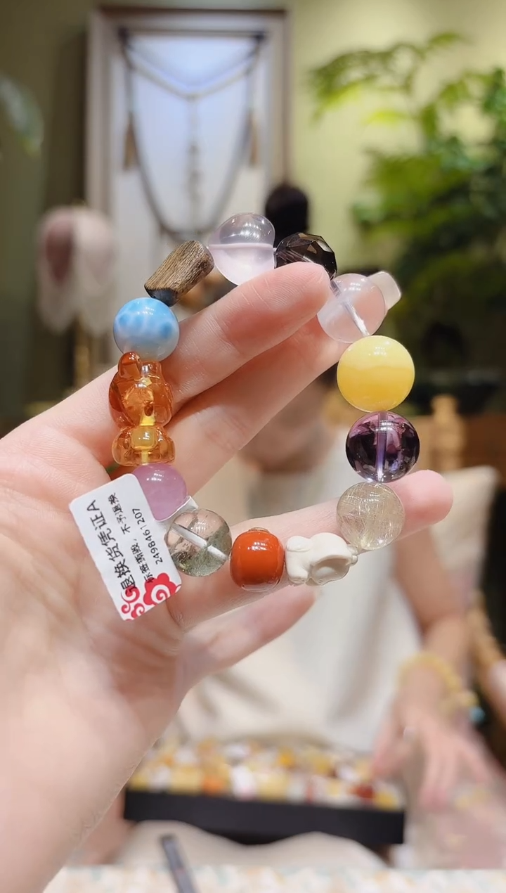 【闪购商品】琥珀裸石未镶嵌花珀熊多宝手串