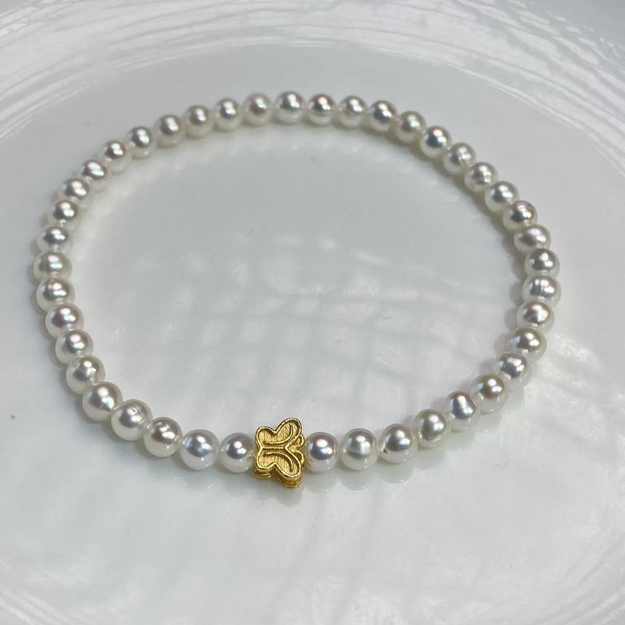 AK淡水珍珠白色时尚s925银小巧精致蝴蝶款手链手串3-4mm