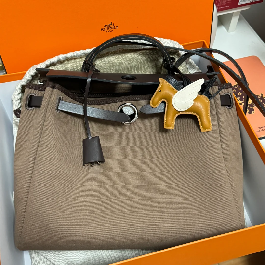 99新 Hermes/爱马仕 小花6欢 herbag 31 大象灰 帆布 T刻 银扣包