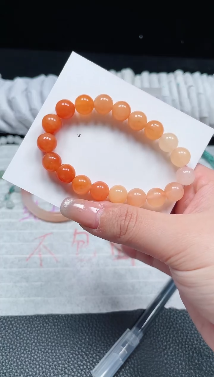 【闪购商品】石英质玉手链未镶嵌柿子红卡10