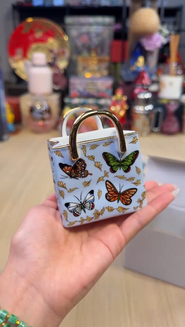 66蓝色蝴蝶提包收纳罐