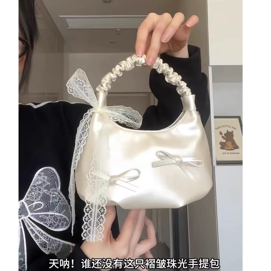 小众设计感蝴蝶结包包2025新款法式手提云朵包高级感单肩斜挎包女