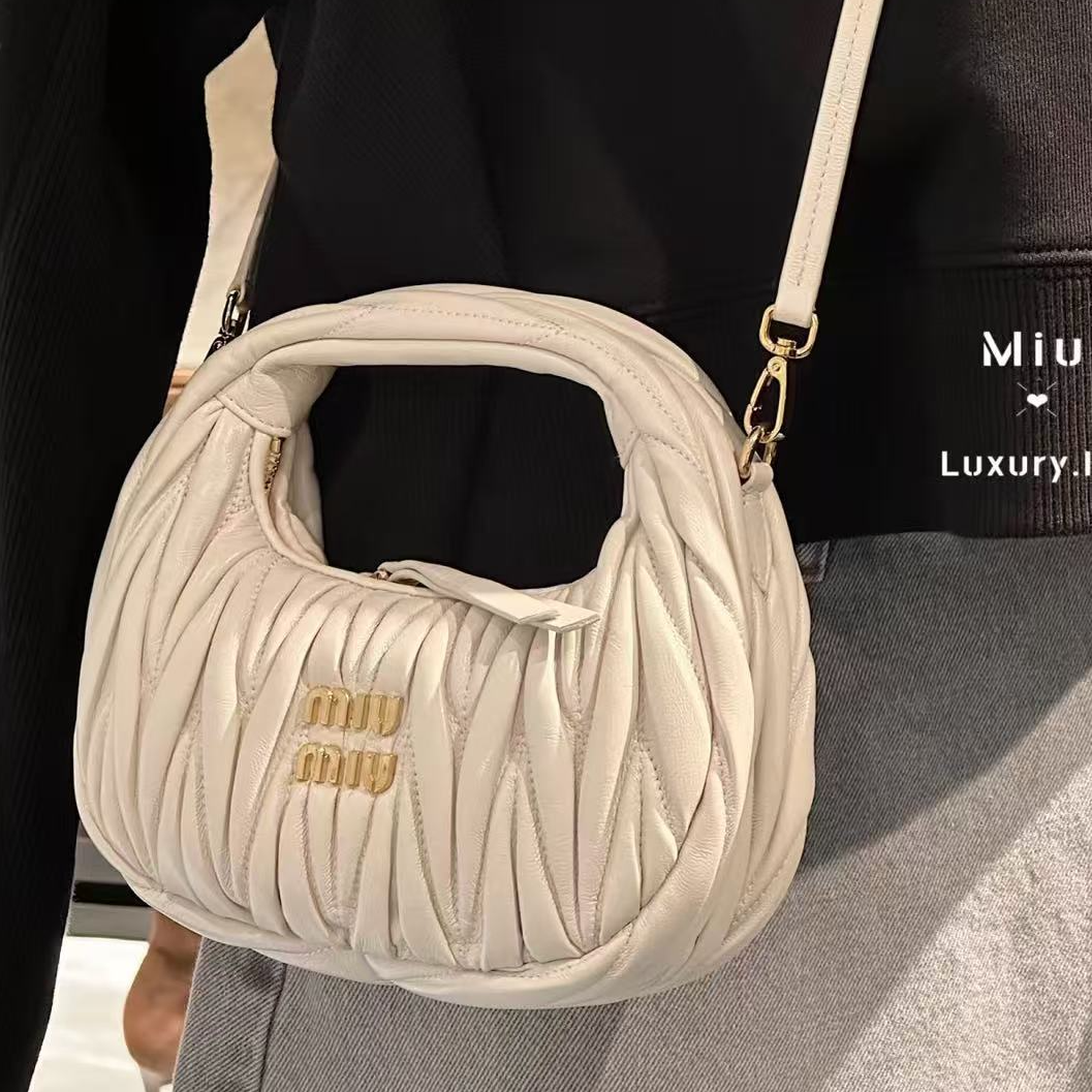 99新 MIU MIU/缪缪 坤球奢选 缪缪迷你wander斜挎包