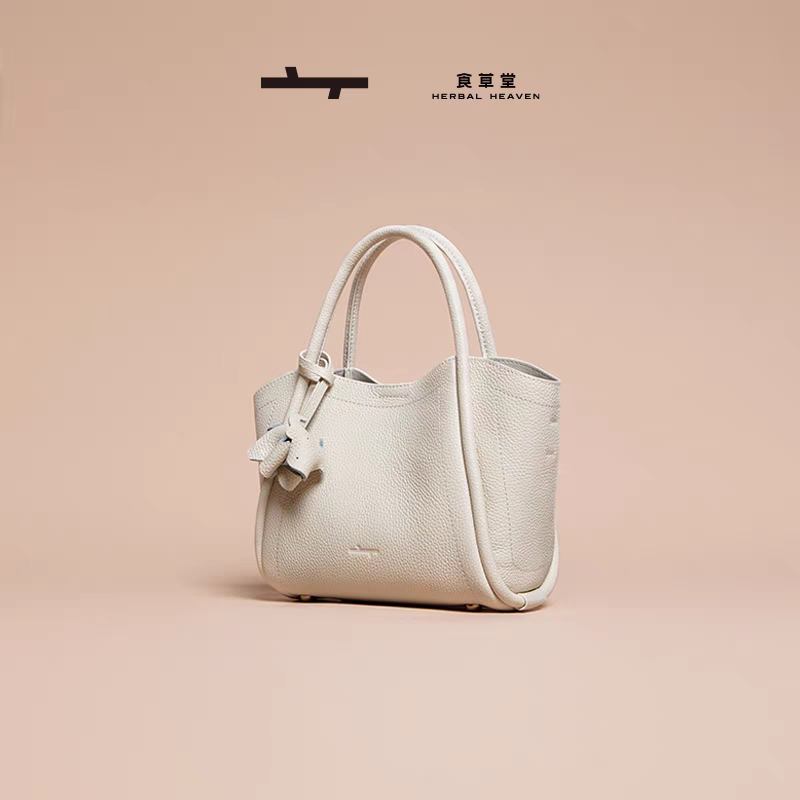 食草堂2025夏季新款百搭单肩随性风女士真皮斜跨手拎包蜜语（H）