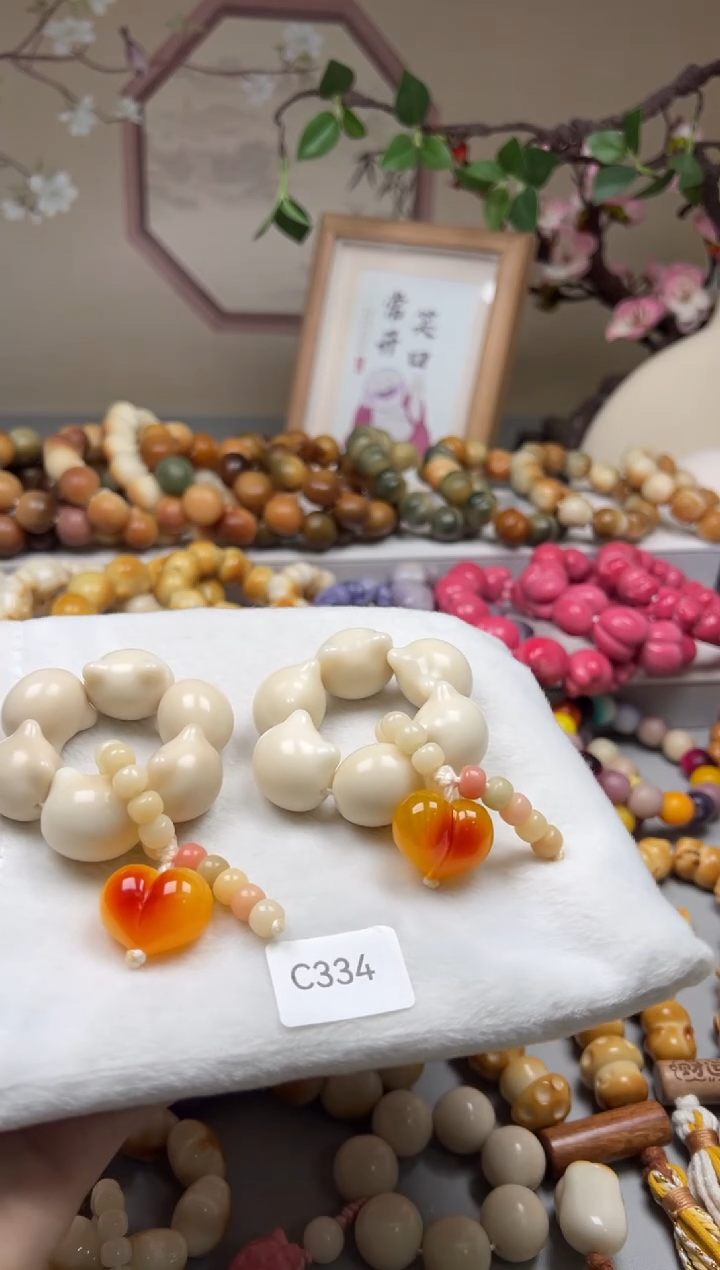 手串菩提根/象牙果C334猫头手捻23-24mm一串通货随机