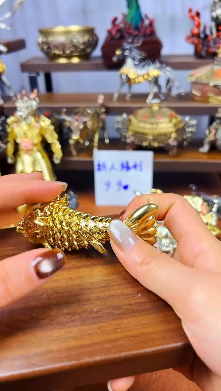 鱼化龙黄铜把件纯色