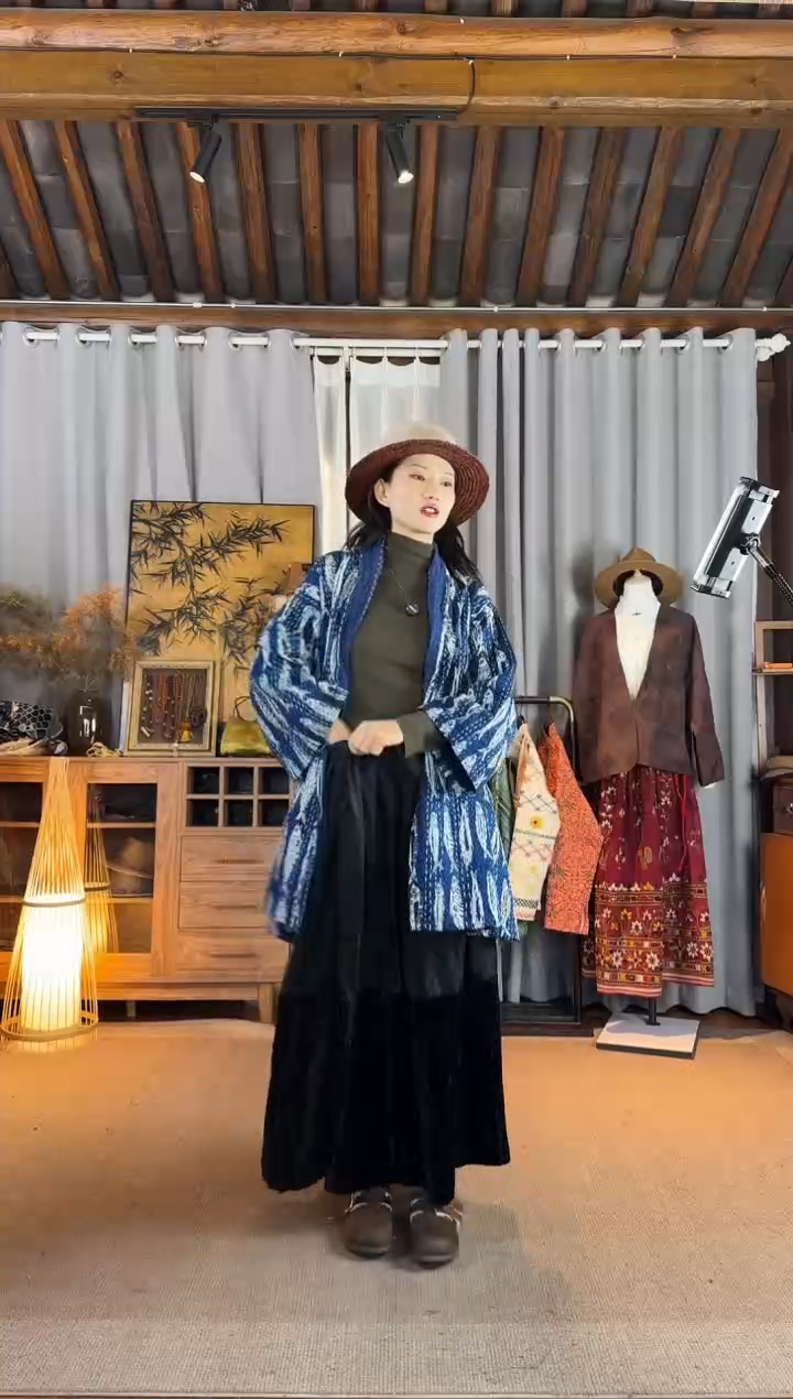 阿****?设计师款鱼多多中长外套