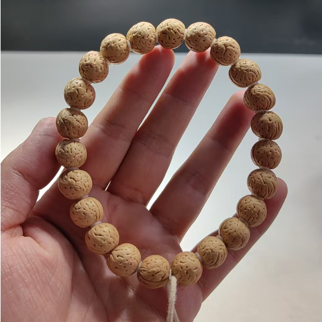 1.2（盘锦奶豆）桃核手串