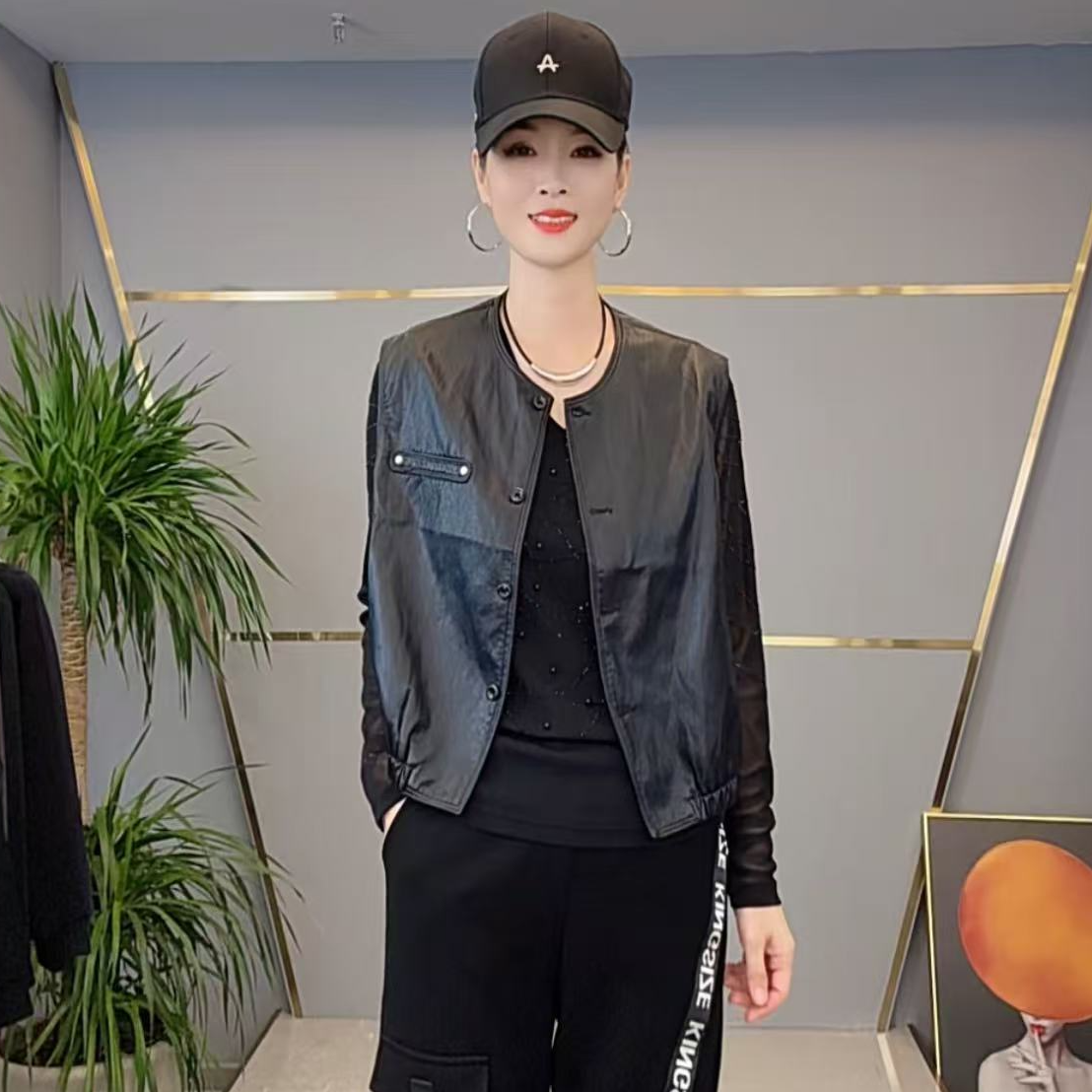 shishu/拾束秋季新款时尚女装个性减龄宽松圆领无袖皮马甲AN6909