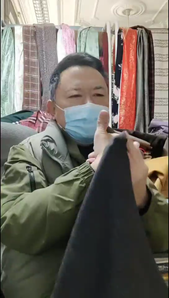 深紫咖雪花针织布料