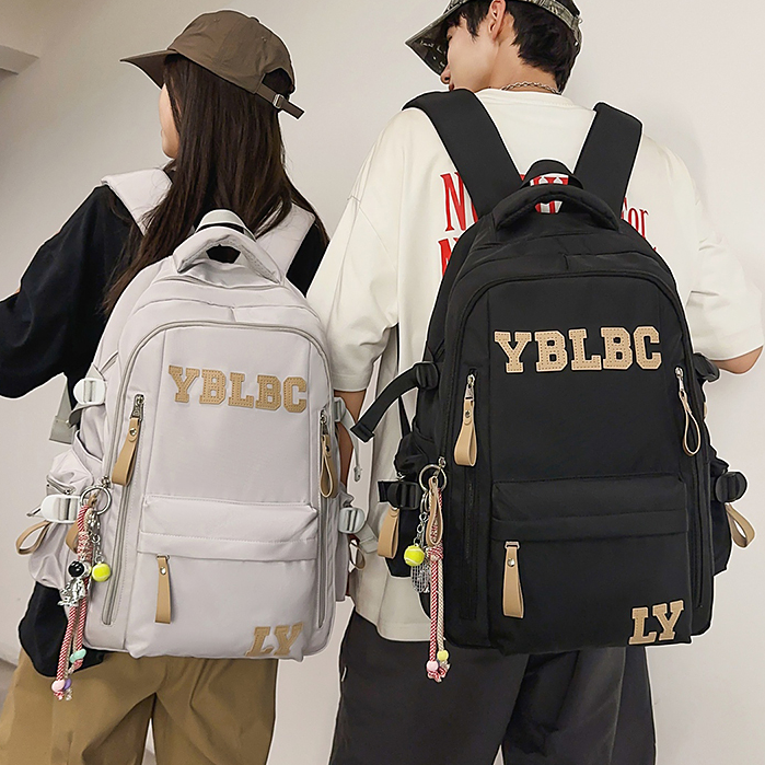 大容量双肩包大学生书包男双初中生高中生女减负护脊高质量背包潮