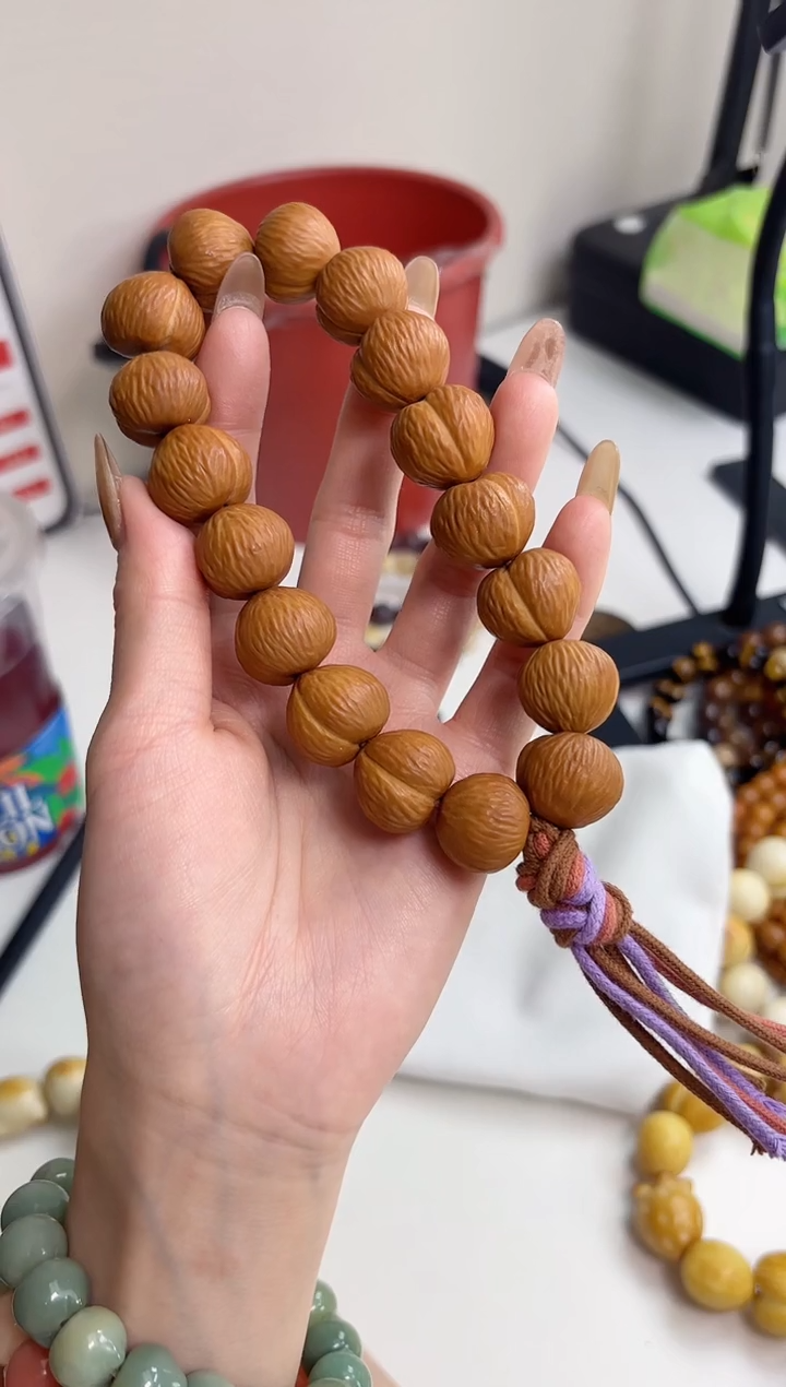 手串菩提根/象牙果猴头拉丝屁桃15*17mm手持
