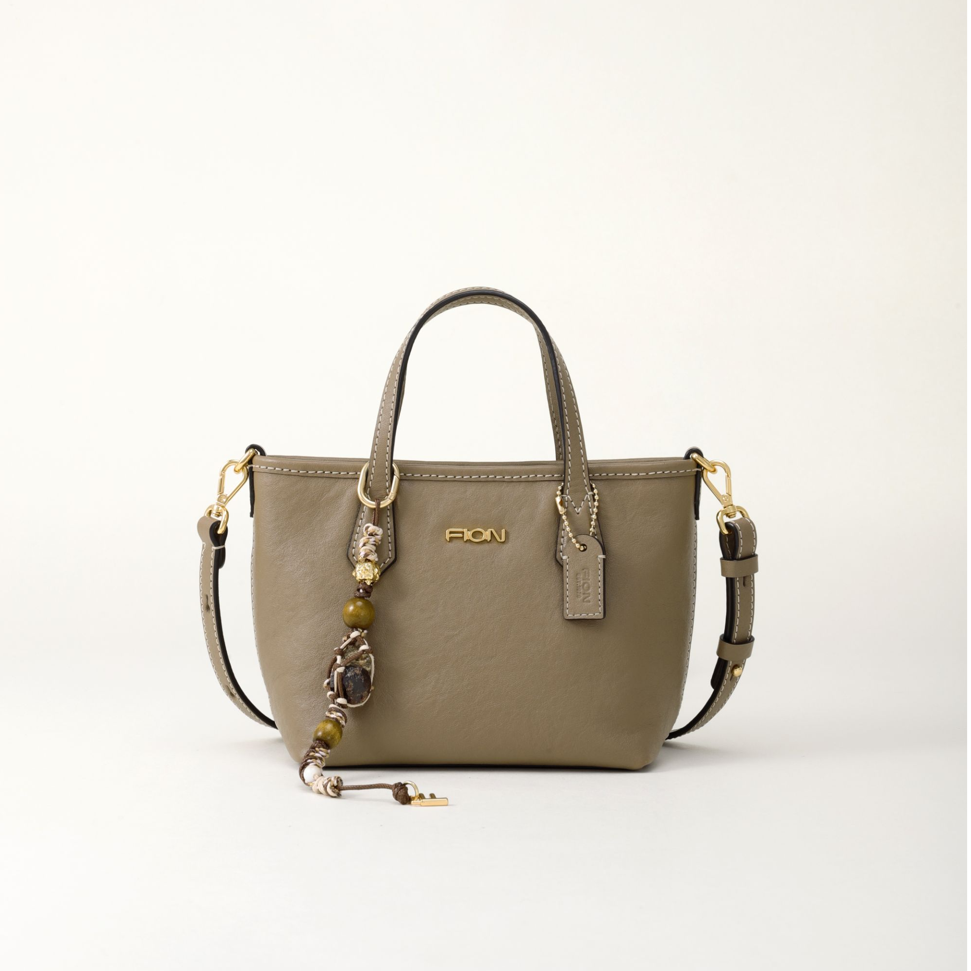 Fion/菲安妮【元旦好礼】真皮手提单肩斜挎菜篮子饺子包FAAFJQD006