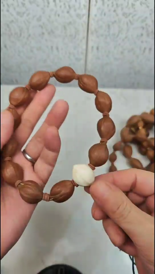 橄榄核吊坠怪核带象牙果三通手持