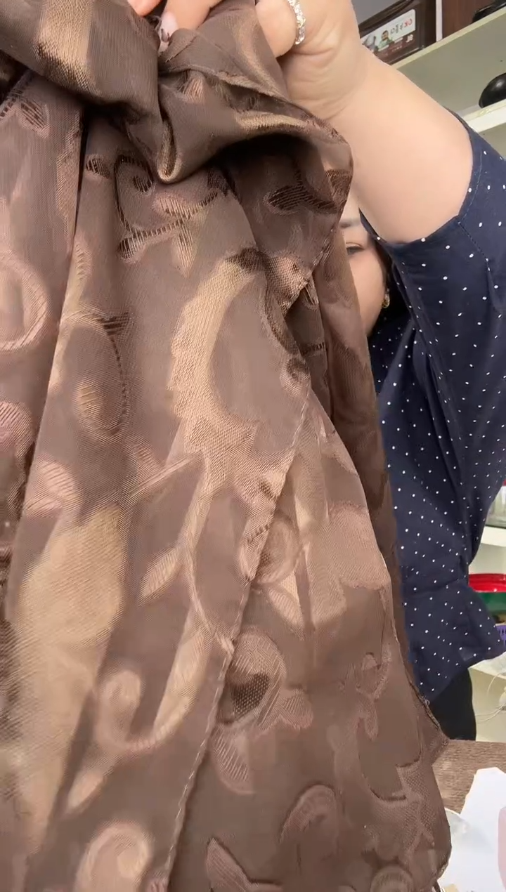 三醋酯纤维招****?灰色围巾