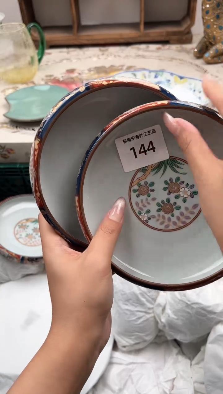 瓷片欣**荣T         144