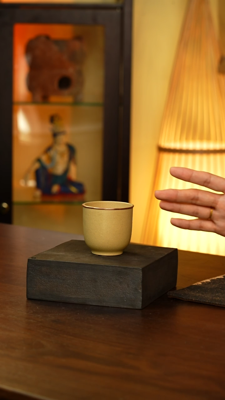 包铜黄紫砂杯...