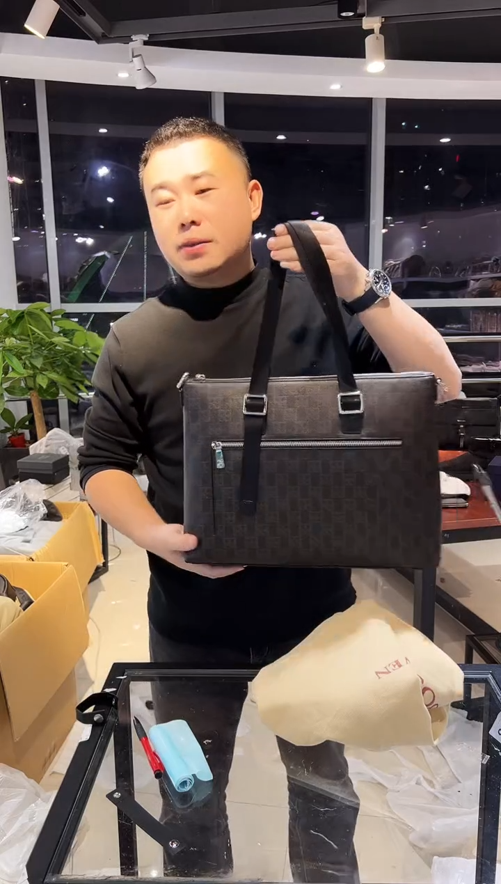 头层牛皮韩爵绅士包包皮具985