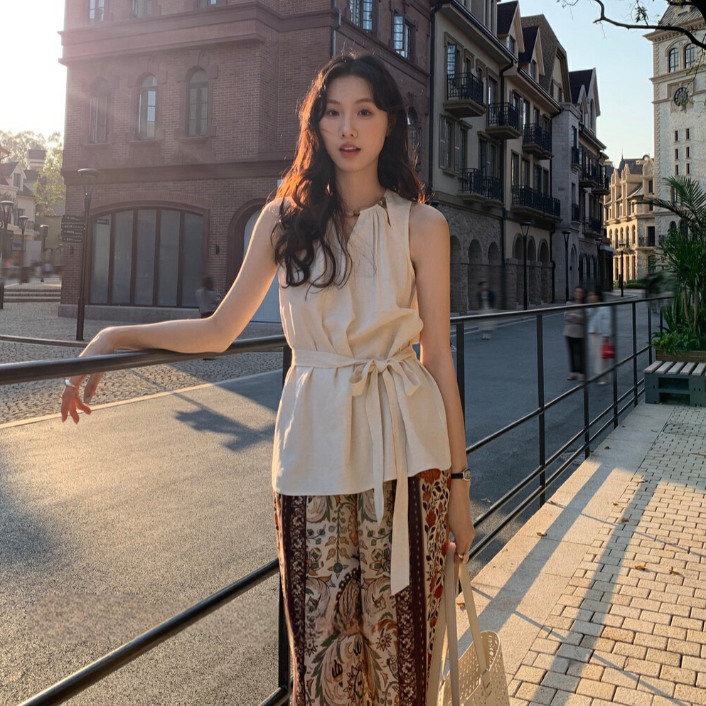 度假风穿搭套装女夏季休闲时尚无袖背心上衣显瘦印花阔腿裤两件套