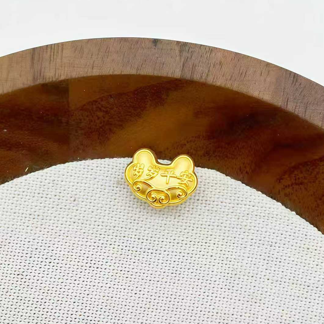 足金999 岁岁平安小锁包吊坠 1.04