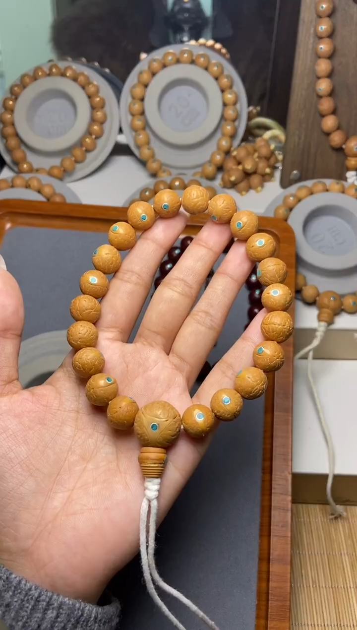 吊坠凤眼菩提12凤眼松钉手串