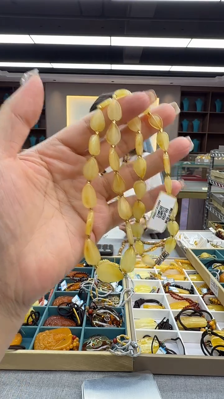 琥珀颈饰未镶嵌52秒拍号 假一罚三 