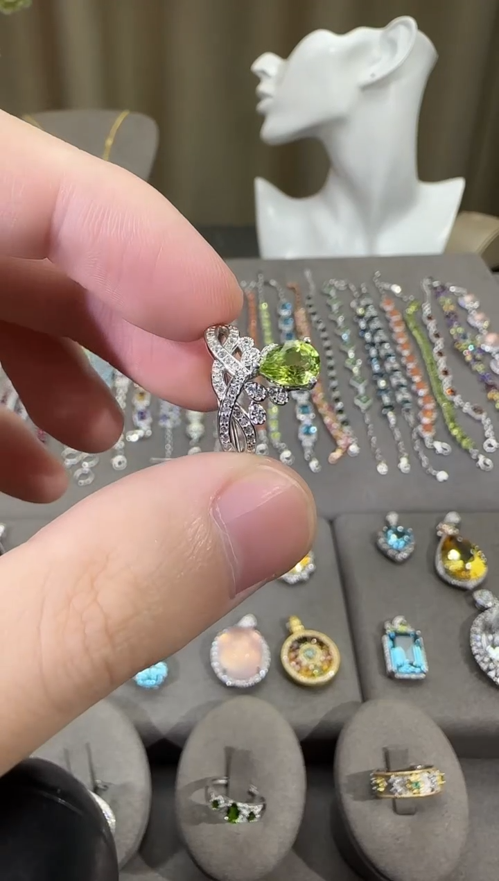 银S925镶嵌戒指橄榄石5*7mm戒指水滴款