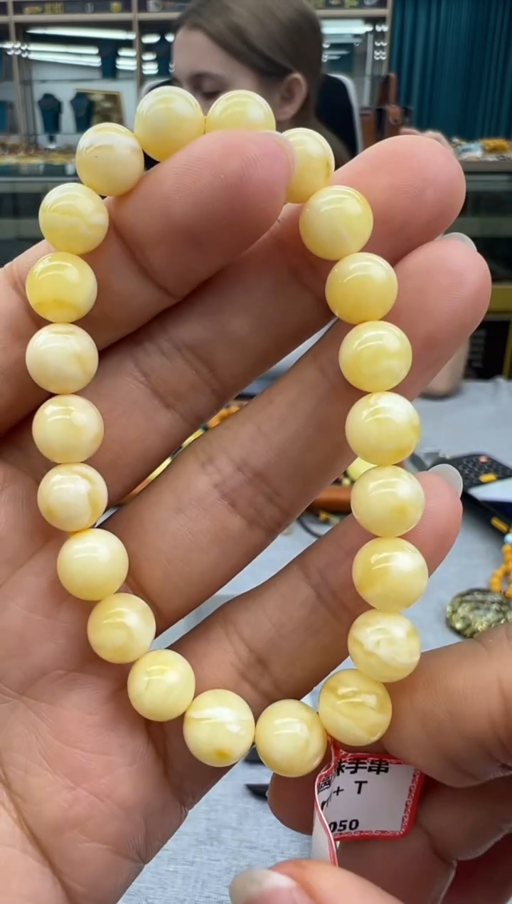 未镶嵌琥珀手链174秒拍号假一罚十
