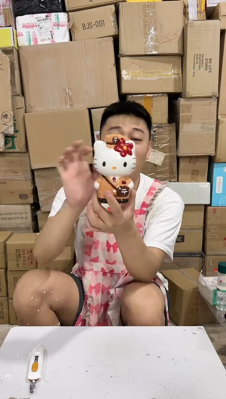 瓷片棕色kt猫邮递员存钱罐