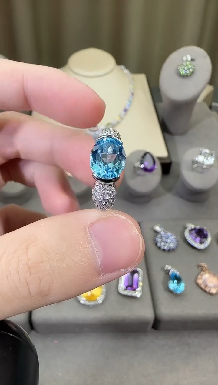 银S925镶嵌戒指托帕石10*8mm妖姬蓝戒指