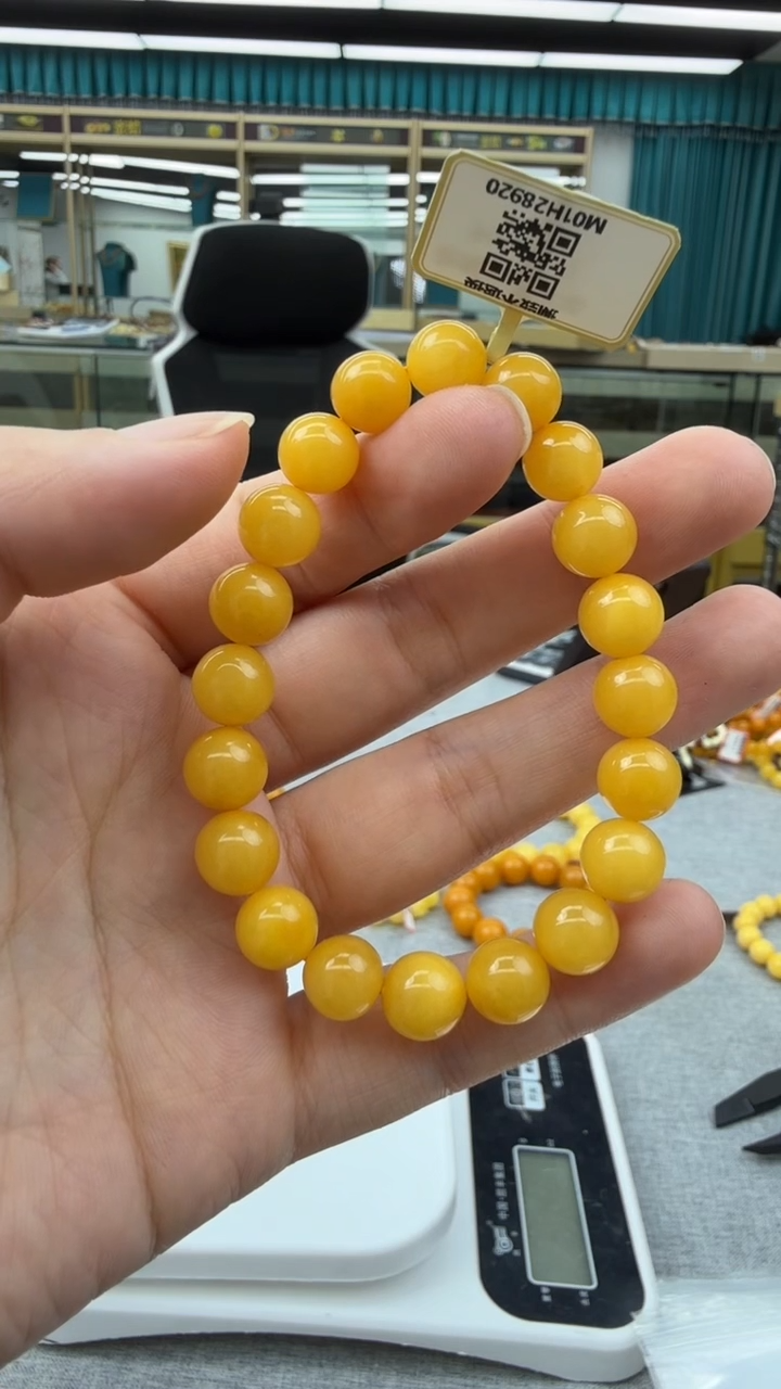 未镶嵌琥珀手链77秒拍号 假一罚三