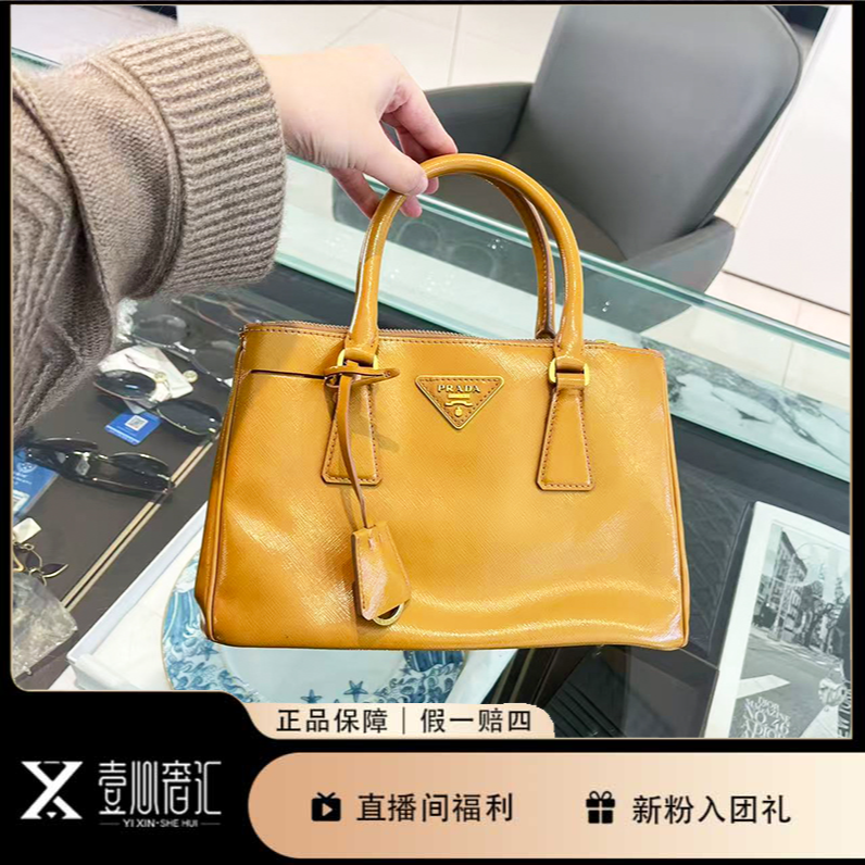 95新 Prada/普拉达 姜黄色小号杀手女士手提单肩包