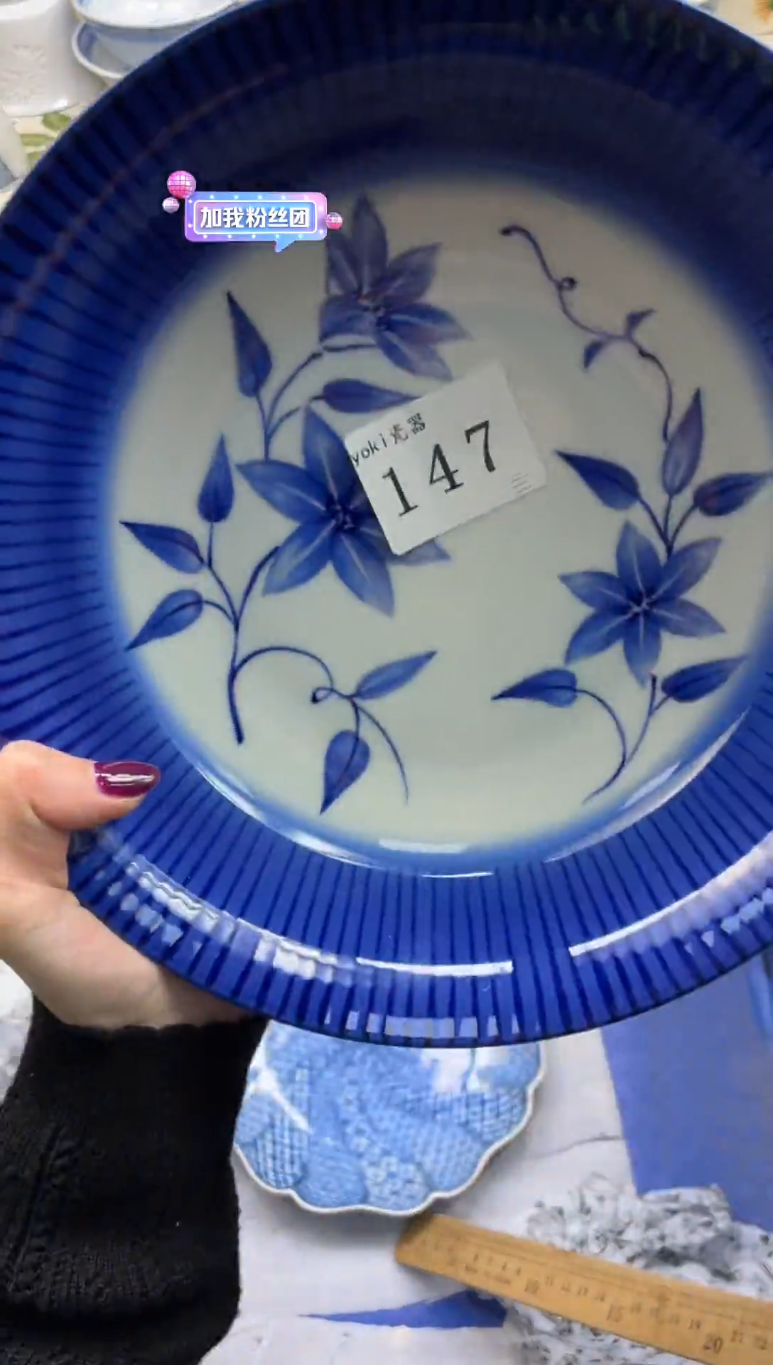 瓷片依**Q           147