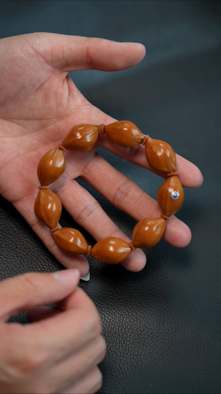 手串/手链橄榄核1.7抛光三面佛 带标款（标色随机）