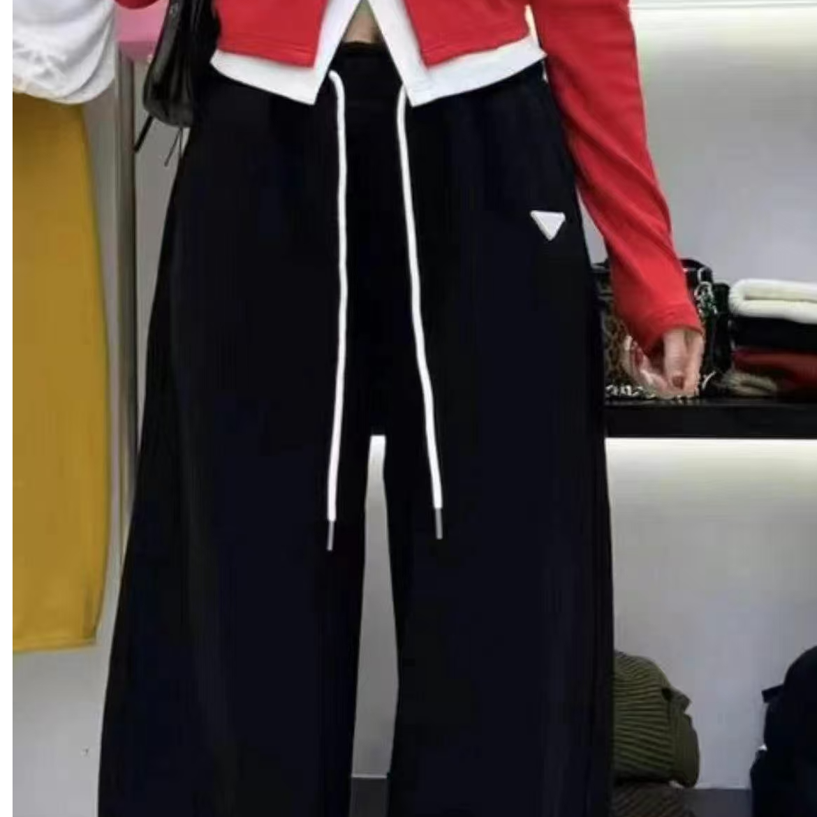三角标运动休闲卫裤