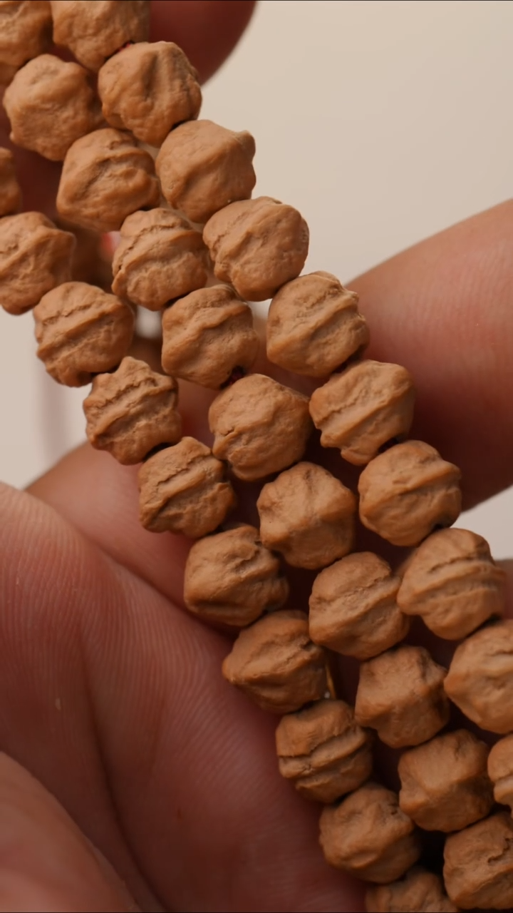 柏香籽/百香籽手串红皮玉化横打