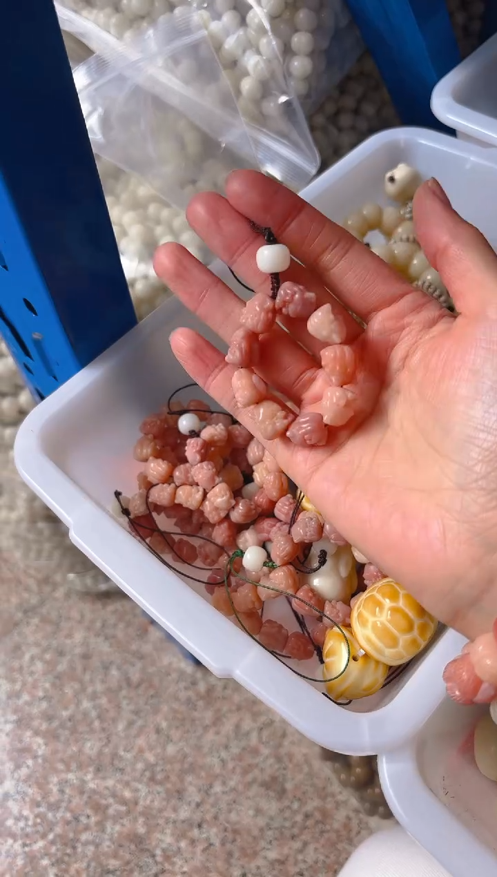 吊坠菩提根/象牙果粉色凤九手机链