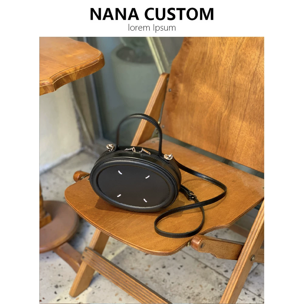 真皮包包女春夏新款时尚小圆饼手提包口红手机单肩斜挎包