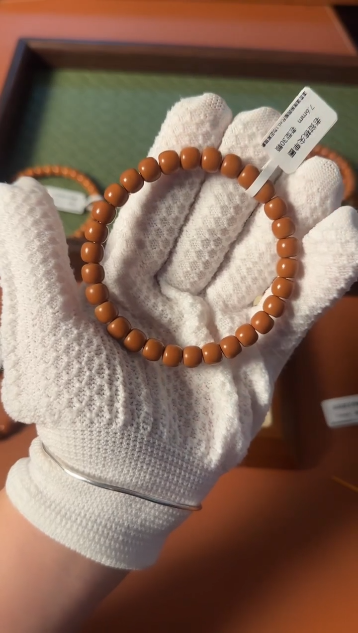 手串橄榄核袁【168】7.6mm老挝核尖老型单圈、面无白