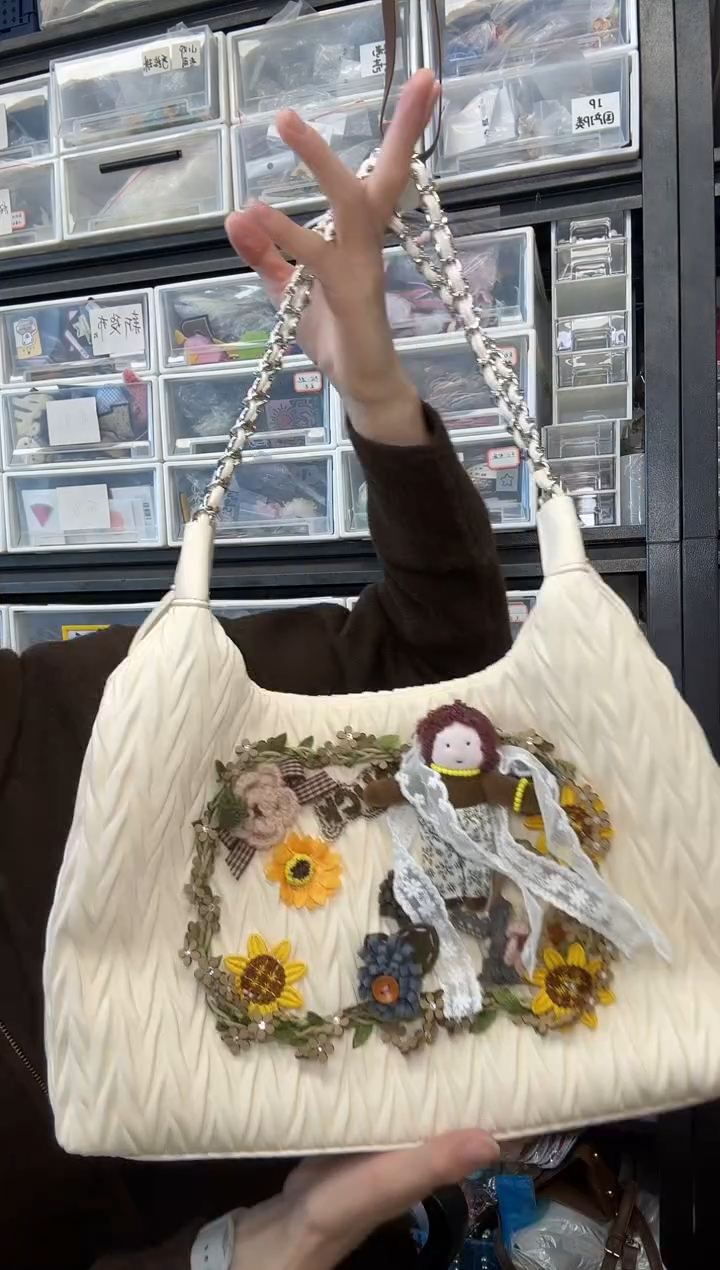 PU早****.必灵手工潮包包