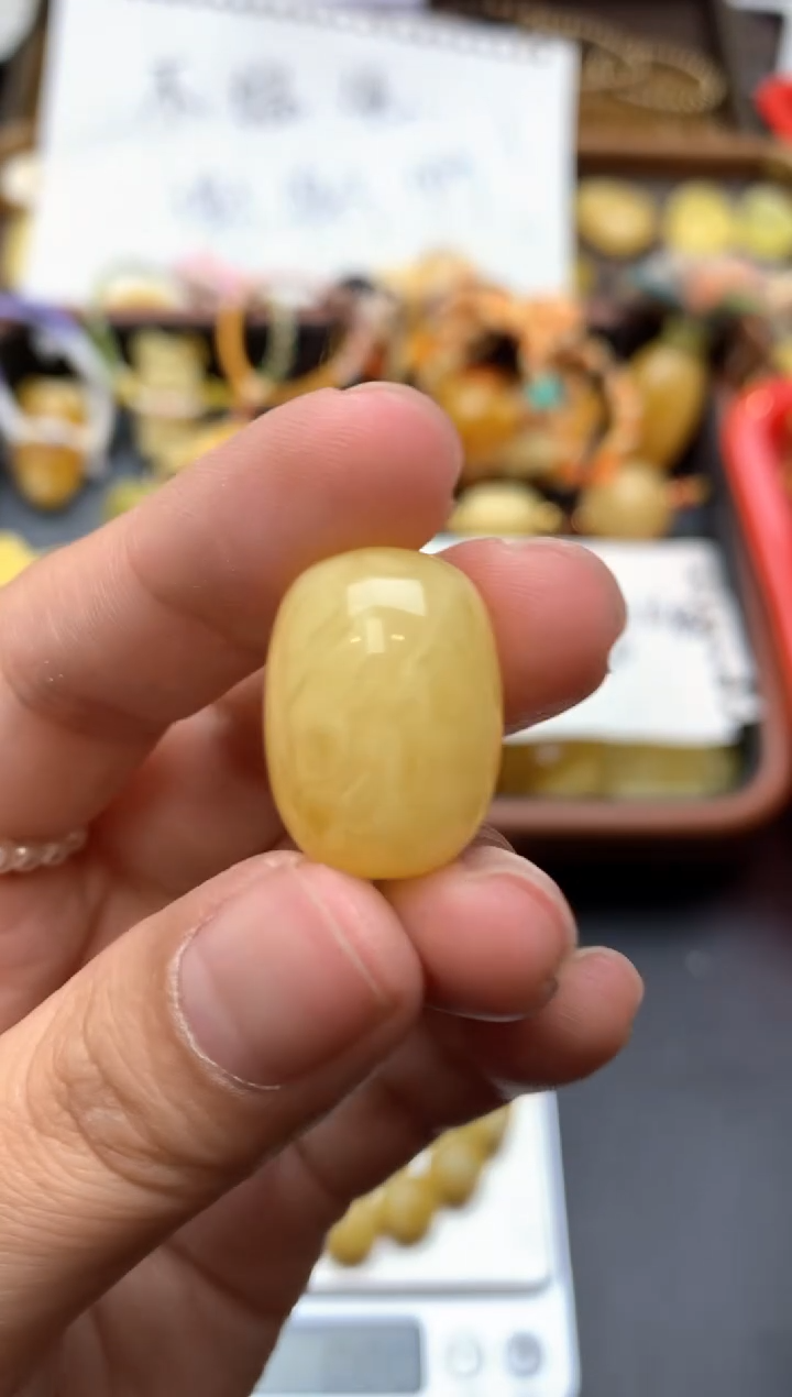 【闪购商品】琥珀珠宝奇石未镶嵌055琥珀蜜蜡花粉有纹小坑介意勿拍