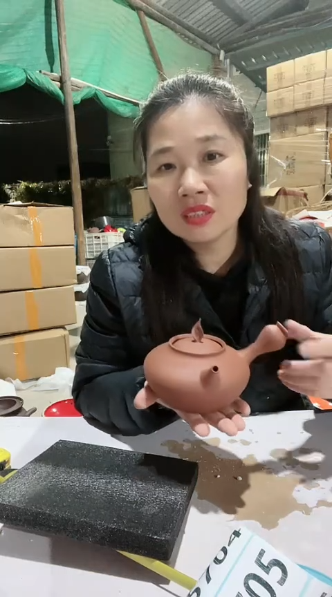 陶瑕疵红泥手把跳跳壶