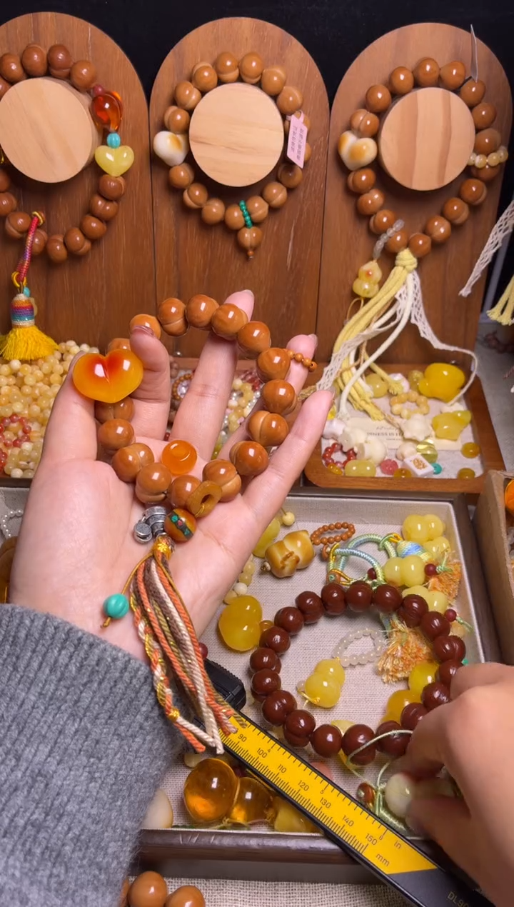 手串猴头核桃全品手工姬宝俏色心黄隔片橄榄核跑环藏式流苏手持