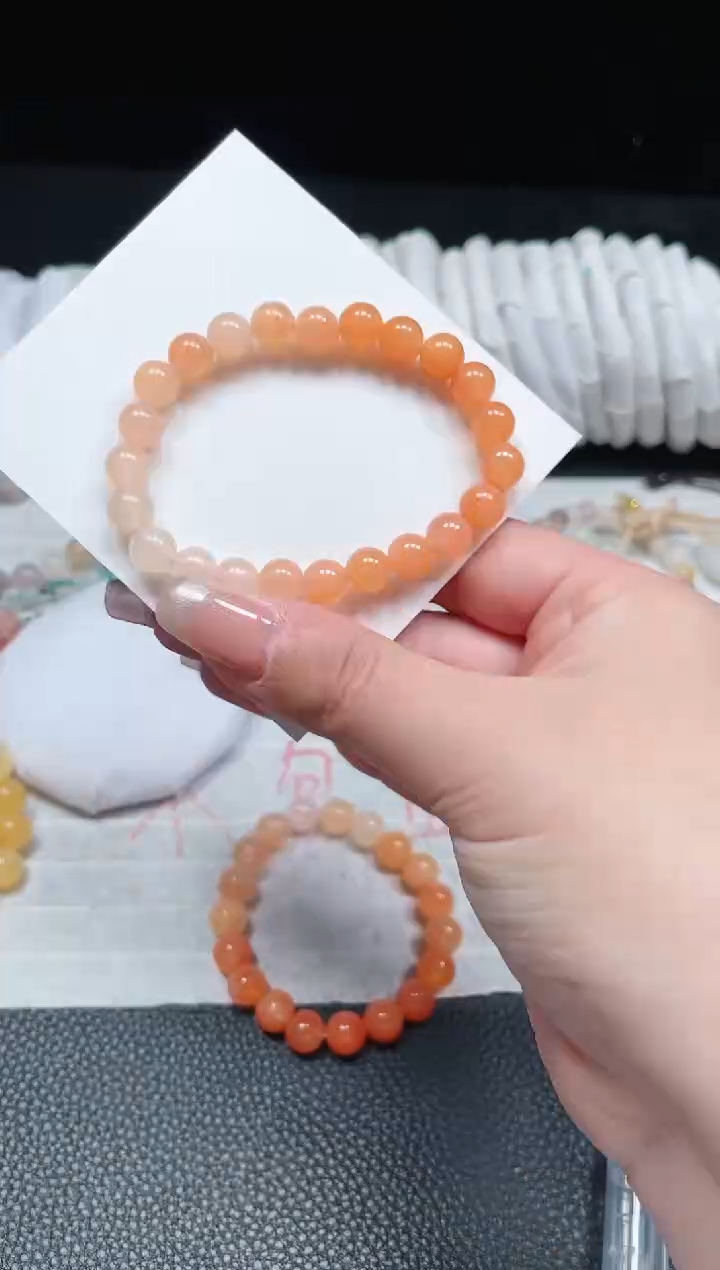 【闪购商品】石英质玉手链未镶嵌柿子红卡8