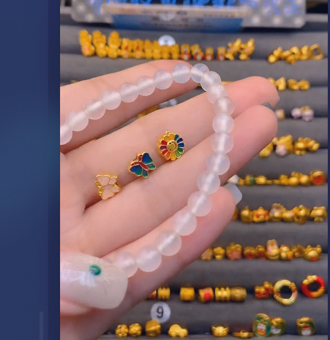 足金999太阳花*2+小蝴蝶*2玛 瑙手串/ 多样性发