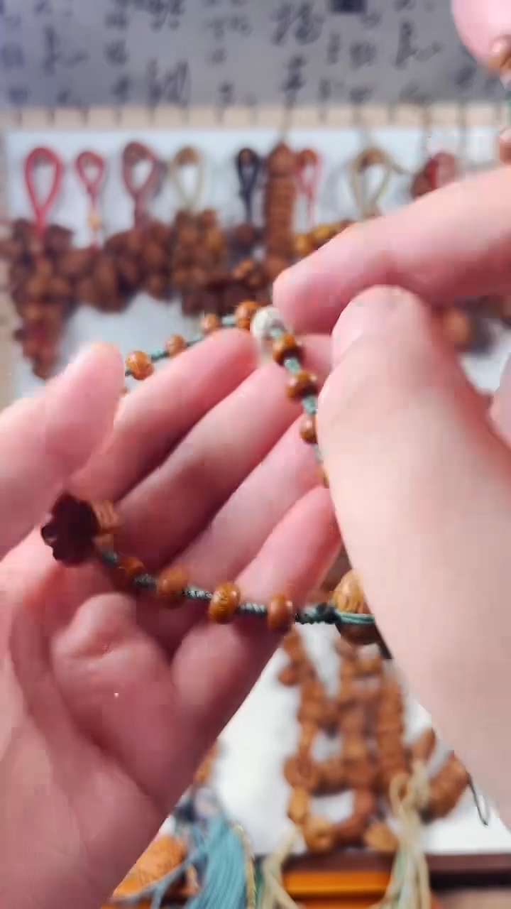 桃核雕刻平安扣手机链